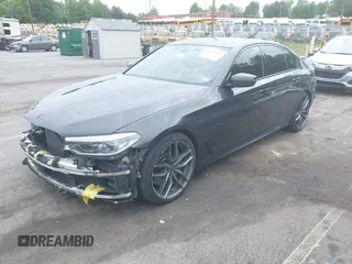 2018 BMW 5 Series M550i xDrive with VIN WBAJB9C56JB035364, listed as a IAAI auction lot 42179145 with 112,123 mi miles and . Bid and sale history available at DreamBid. Image 21.
