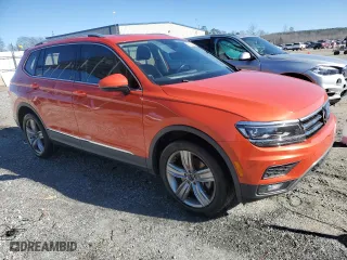 2018 Volkswagen Tiguan SEL Premium with VIN 3VV5B7AX3JM123571, listed as a Copart auction lot 86629694 with 122,904 mi miles and Salvage Title. Bid and sale history available at carsss.com. Image 4.