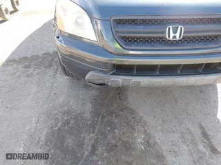 2004 Honda Pilot EX with VIN 5FNYF18674B006210, listed as a IAAI auction lot 41840395 with 188,754 mi miles. Bid and sale history available at carsss.com. Image 12.