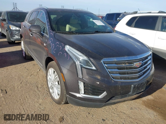 2018 Cadillac XT5 Premium Luxury FWD with VIN 1GYKNERS6JZ233125, listed as a IAAI auction lot 42253779 with 97,266 mi miles and . Bid and sale history available at DreamBid. Image 1.