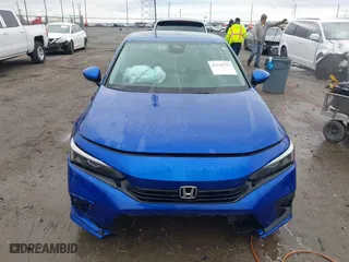 2022 Honda Civic Sedan EX with VIN 2HGFE1F74NH325843, listed as a IAAI auction lot 41116731 with 69,429 mi miles. Bid and sale history available at carsss.com. Image 12.