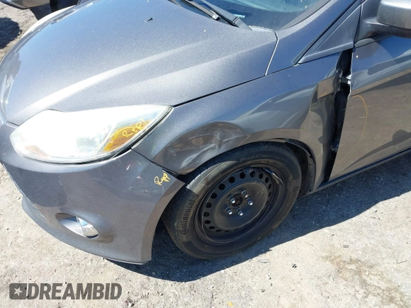 2012 Ford Focus SE with VIN 1FAHP3F2XCL433827, listed as a IAAI auction lot 41843960 with 156,343 mi miles. Bid and sale history available at carsss.com. Image 6.