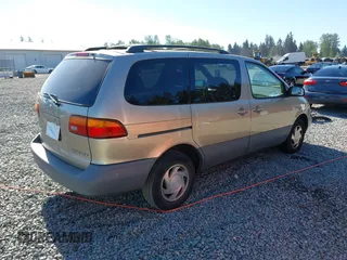 2000 Toyota Sienna LE with VIN 4T3ZF13C5YU227631, listed as a IAAI auction lot 42173057 with 154,152 mi miles and . Bid and sale history available at DreamBid. Image 4.