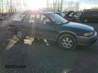 1996 Subaru Legacy Outback with VIN 4S3BG6851T7977375, listed as a Copart auction lot 41391625 with 188,726 mi miles and Salvage title. Bid and sale history available at DreamBid. Image 4.