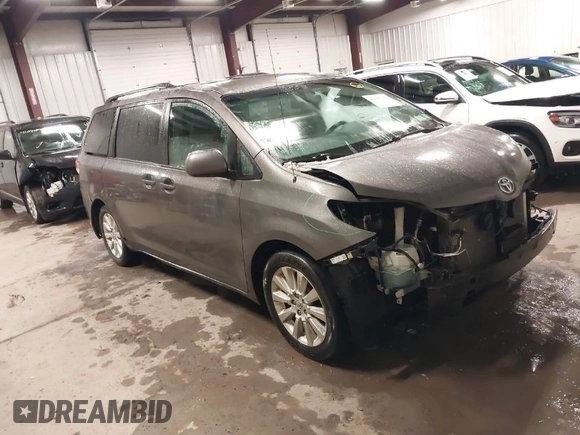 2011 Toyota Sienna LE with VIN 5TDJK3DC2BS013045, listed as a IAAI auction lot 41127037 with 239,401 mi miles. Bid and sale history available at carsss.com. Image 1.