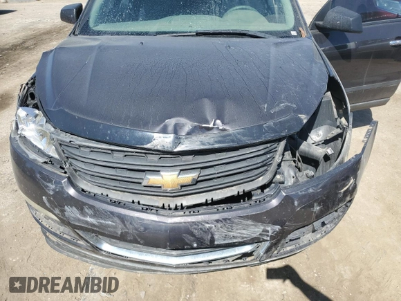 2017 Chevrolet Traverse LS with VIN 1GNKRFKD7HJ149777, listed as a Copart auction lot 56636575 with 122,963 mi miles and Salvage title. Bid and sale history available at DreamBid. Image 12.