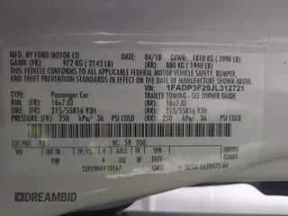 2018 Ford Focus SE with VIN 1FADP3F29JL312721, listed as a IAAI auction lot 41012098 with 126,214 mi miles. Bid and sale history available at carsss.com. Image 9.