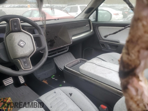 2022 Rivian R1T Adventure z VIN 7FCTGAAA5NN014020, wystawiony jako Copart lot #81367764 z przebiegiem Nie podano mil oraz Szkody całkowita. Historia ofert i sprzedaży dostępna na DreamBid. Obrazek 7.