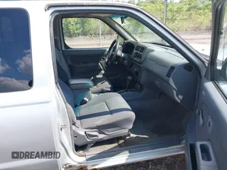 2001 Nissan Frontier SE Desert Runner z VIN 1N6ED26T61C303868, wystawiony jako IAAI lot #42698412 z przebiegiem 223 551 mil mil oraz . Historia ofert i sprzedaży dostępna na DreamBid. Obrazek 5.