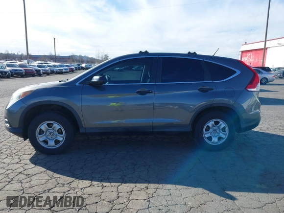 2014 Honda CR-V LX with VIN 2HKRM4H3XEH621242, listed as a IAAI auction lot 41734669 with 127,664 mi miles. Bid and sale history available at carsss.com. Image 14.