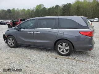 2019 Honda Odyssey EX-L with VIN 5FNRL6H74KB123002, listed as a Copart auction lot 51595065 with 60,033 mi miles and Salvage Title. Bid and sale history available at carsss.com. Image 2.