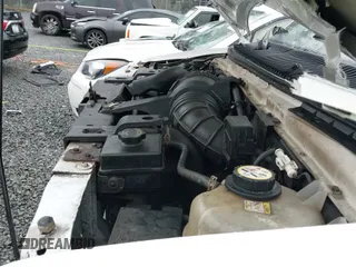 2004 Ford Econoline Cargo with VIN 1FTSS34L84HA56056, listed as a IAAI auction lot 41235862 with 215,095 mi miles and . Bid and sale history available at DreamBid. Image 19.