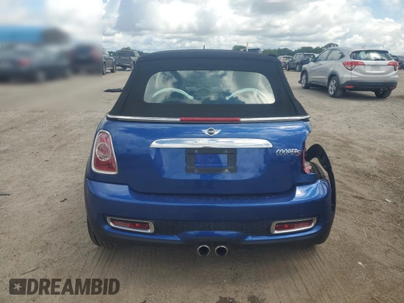 2015 MINI Convertible S with VIN WMWZP3C59F2A91231, listed as a Copart auction lot 59296415 with 31,642 mi miles and Salvage title. Bid and sale history available at DreamBid. Image 6.