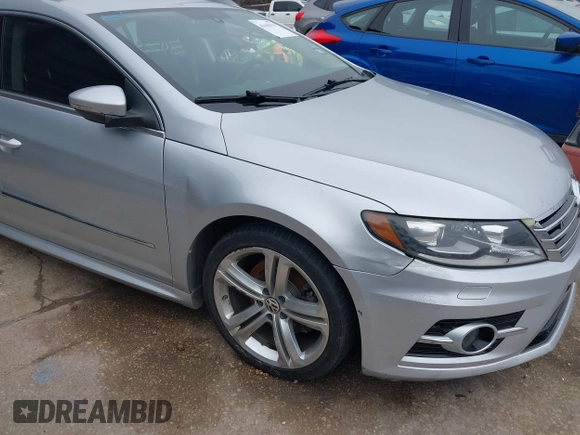 2014 Volkswagen CC Sport with VIN WVWBN7ANXEE501758, listed as a IAAI auction lot 41443518 with 193,259 mi miles and . Bid and sale history available at DreamBid. Image 12.