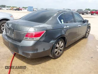 2009 Honda Accord EX-L with VIN 1HGCP36819A001769, listed as a IAAI auction lot 42032375 with 220,463 mi miles and . Bid and sale history available at DreamBid. Image 4.