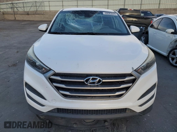 2018 Hyundai Tucson SE z VIN KM8J2CA41JU667909, wystawiony jako Copart lot #49583005 z przebiegiem Nie podano mil oraz Szkody całkowita. Historia ofert i sprzedaży dostępna na DreamBid. Obrazek 5.