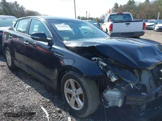 2015 Kia Optima LX with VIN 5XXGM4A75FG465435, listed as a IAAI auction lot 41738703 with 196,915 mi miles. Bid and sale history available at carsss.com. Image 1.