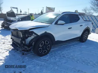 2024 Hyundai Santa Cruz SEL z VIN 5NTJCDAE2RH093666, wystawiony jako IAAI lot #41639659 z przebiegiem 28 599 mil mil oraz . Historia ofert i sprzedaży dostępna na DreamBid. Obrazek 20.