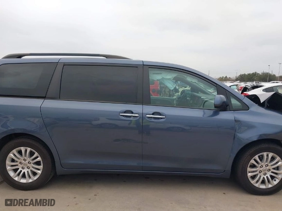 2016 Toyota Sienna XLE with VIN 5TDYK3DC5GS750844, listed as a IAAI auction lot 41232706 with 144,718 mi miles. Bid and sale history available at carsss.com. Image 14.