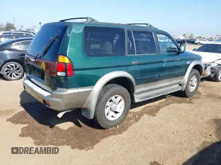2000 Mitsubishi Montero LS z VIN JA4LS31H2YP027291, wystawiony jako IAAI lot #42519886 z przebiegiem 249 915 mil mil oraz . Historia ofert i sprzedaży dostępna na DreamBid. Obrazek 4.