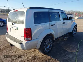 2007 Dodge Nitro SLT with VIN 1D8GU58K67W692313, listed as a IAAI auction lot 41441915 with 195,521 mi miles. Bid and sale history available at carsss.com. Image 4.