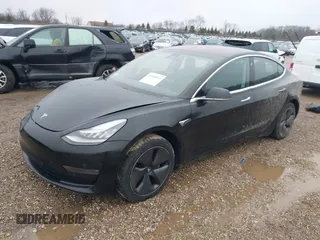 2018 Tesla Model 3 Long Range Battery with VIN 5YJ3E1EB1JF127289, listed as a IAAI auction lot 41484253 with 60,577 mi miles and . Bid and sale history available at DreamBid. Image 2.