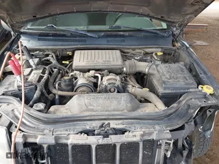 2004 Jeep Grand Cherokee Laredo with VIN 1J4GX48N64C436853, listed as a IAAI auction lot 41785918 with 118,578 mi miles. Bid and sale history available at carsss.com. Image 10.