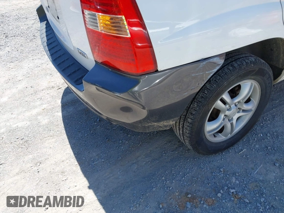 2006 Kia Sportage LX with VIN KNDJF723567151614, listed as a IAAI auction lot 42022102 with 128,564 mi miles and . Bid and sale history available at carsss.com. Image 17.