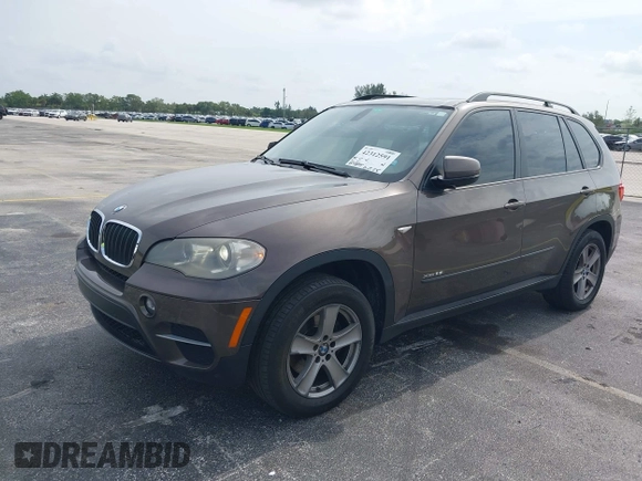 2012 BMW X5 35i z VIN 5UXZV4C53CL991140, wystawiony jako IAAI lot #42312591 z przebiegiem 115 875 mil mil oraz . Historia ofert i sprzedaży dostępna na DreamBid. Obrazek 2.