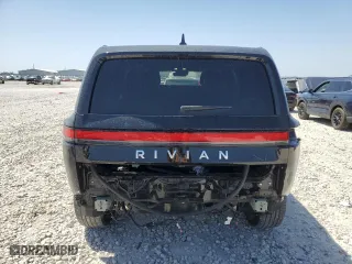 2024 Rivian R1S Adventure with VIN 7PDSGCBA4RN044958, listed as a Copart auction lot 49697345 with 17,762 mi miles and Salvage Title. Bid and sale history available at carsss.com. Image 6.