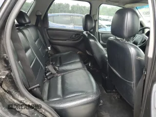 2004 Ford Escape Limited with VIN 1FMCU04164KB51256, listed as a Copart auction lot 58969565 with 137,360 mi miles and Salvage title. Bid and sale history available at DreamBid. Image 11.