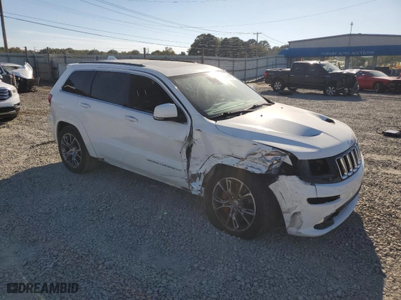 2015 Jeep Grand Cherokee SRT with VIN 1C4RJFDJ4FC625552, listed as a Copart auction lot 77171974 with 114,932 mi miles and Clean Title. Bid and sale history available at carsss.com. Image 4.