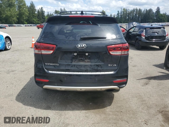 2017 Kia Sorento SX with VIN 5XYPKDA54HG220483, listed as a Copart auction lot 58225025 with 119,376 mi miles and Clean title. Bid and sale history available at DreamBid. Image 6.