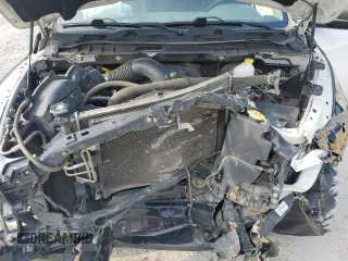 2016 Ram 1500 Tradesman z VIN 3C6RR7KT1GG225540, wystawiony jako Copart lot #58956275 z przebiegiem 172 937 mil mil oraz Szkoda całkowita • Salvage title. Historia ofert i sprzedaży dostępna na DreamBid. Obrazek 11.