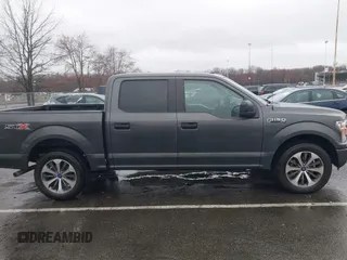 2019 Ford F-150 XL with VIN 1FTEW1CP8KKE94974, listed as a IAAI auction lot 41864485 with 114,893 mi miles and . Bid and sale history available at DreamBid. Image 13.