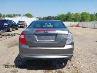 2012 Ford Fusion SE z VIN 3FAHP0HA4CR232641, wystawiony jako IAAI lot #42057070 z przebiegiem 180 793 mil mil oraz . Historia ofert i sprzedaży dostępna na DreamBid. Obrazek 16.