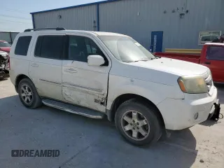 2011 Honda Pilot Touring z VIN 5FNYF3H98BB005411, wystawiony jako Copart lot #52392765 z przebiegiem 155 541 mil mil oraz Szkoda całkowita • Salvage title. Historia ofert i sprzedaży dostępna na DreamBid. Obrazek 4.