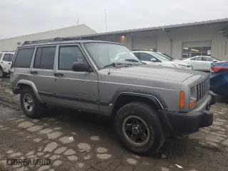2000 Jeep Cherokee Police with VIN 1J4FF48S8YL181942, listed as a Copart auction lot 80325244 with 153,497 mi miles and Salvage Title. Bid and sale history available at carsss.com. Image 4.