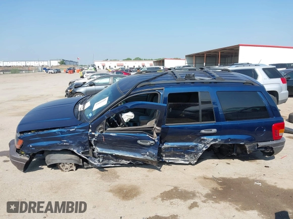 2000 Jeep Grand Cherokee Laredo with VIN 1J4G248S5YC413977, listed as a IAAI auction lot 42045808 with Not provided miles and . Bid and sale history available at DreamBid. Image 14.