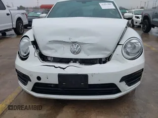 2018 Volkswagen Beetle S with VIN 3VWFD7AT3JM703443, listed as a IAAI auction lot 41437909 with 76,757 mi miles. Bid and sale history available at carsss.com. Image 6.