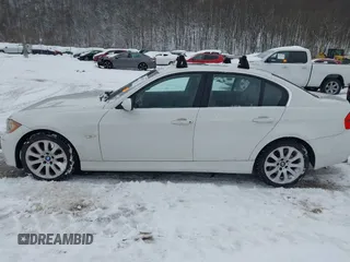 2006 BMW 3 Series 330xi with VIN WBAVD33556KL52150, listed as a IAAI auction lot 41307691 with 168,546 mi miles. Bid and sale history available at carsss.com. Image 14.
