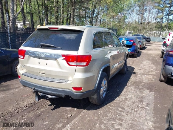 2011 Jeep Grand Cherokee Laredo with VIN 1J4RR4GG8BC590094, listed as a IAAI auction lot 41990149 with 178,510 mi miles. Bid and sale history available at carsss.com. Image 4.