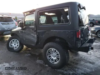 2017 Jeep Wrangler Willys Wheeler with VIN 1C4AJWAG6HL567730, listed as a Copart auction lot 87739395 with 46,286 mi miles and Salvage Title. Bid and sale history available at DreamBid. Image 2.