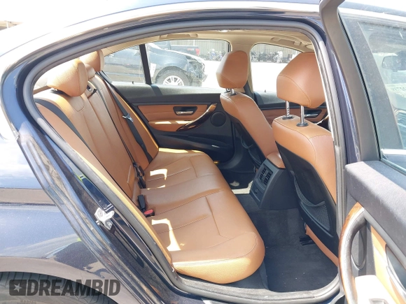 2013 BMW 3 Series 328i with VIN WBA3C1G51DNR49252, listed as a IAAI auction lot 42322739 with 119,421 mi miles and . Bid and sale history available at DreamBid. Image 8.