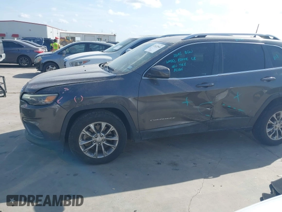 2019 Jeep Cherokee Latitude Plus with VIN 1C4PJLLB0KD382309, listed as a IAAI auction lot 41812968 with 144,368 mi miles. Bid and sale history available at carsss.com. Image 15.