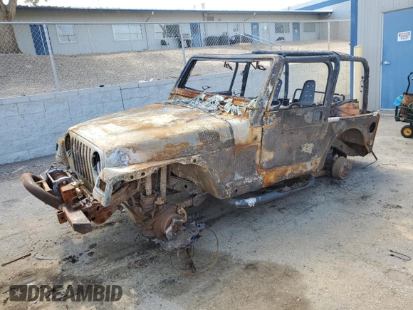 1999 Jeep Wrangler Sport with VIN 1J4FY19S3XP468927, listed as a Copart auction lot 64190184 with 0 mi miles and Non Repairable. Bid and sale history available at carsss.com. Image 1.