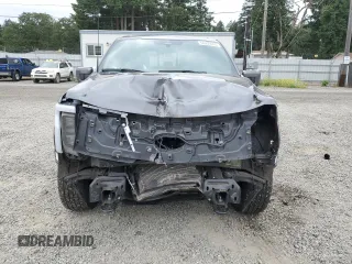 2023 Ford F-150 Lightning Pro with VIN 1FT6W1EV9PWG25278, listed as a Copart auction lot 60293095 with 24,450 mi miles and Salvage title. Bid and sale history available at DreamBid. Image 5.