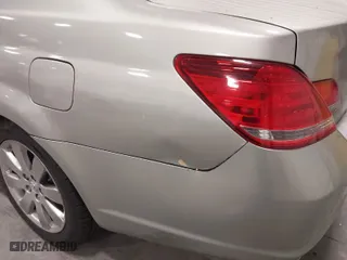 2005 Toyota Avalon XL with VIN 4T1BK36B65U023629, listed as a IAAI auction lot 41963531 with 255,044 mi miles. Bid and sale history available at carsss.com. Image 6.