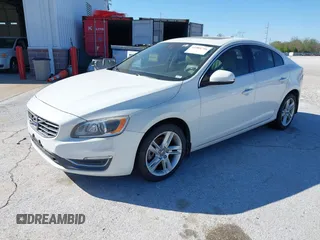 2015 Volvo S60 T5 Drive-E Platinum with VIN YV140MFM7F1346644, listed as a IAAI auction lot 41984716 with 78,210 mi miles. Bid and sale history available at carsss.com. Image 2.