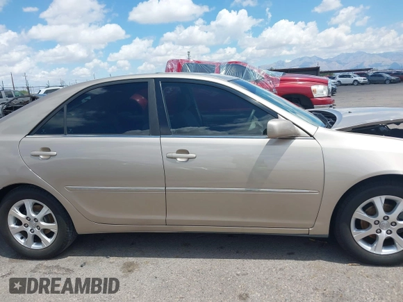 2006 Toyota Camry STD z VIN 4T1BE30KX6U658158, wystawiony jako IAAI lot #42394262 z przebiegiem 102 830 mil mil oraz . Historia ofert i sprzedaży dostępna na DreamBid. Obrazek 13.